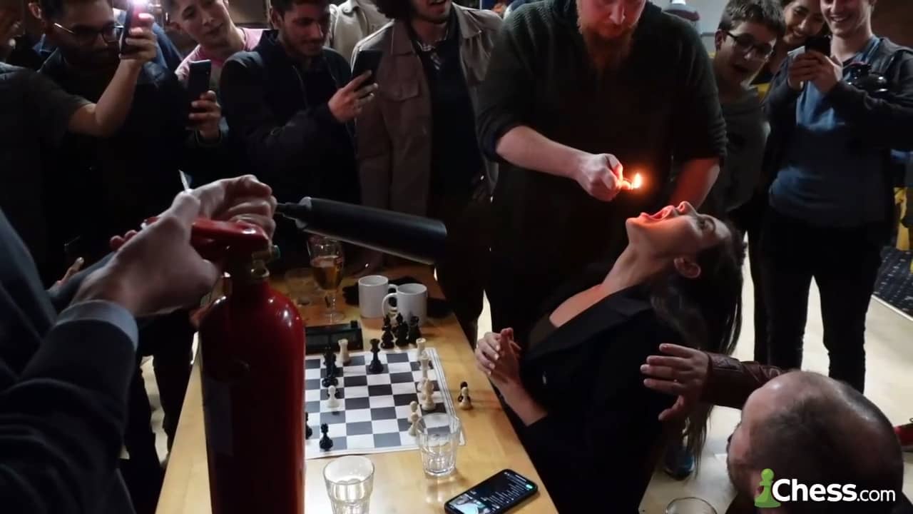 Alexandra Botez drinks a flaming sambuca at Battersea Chess Club