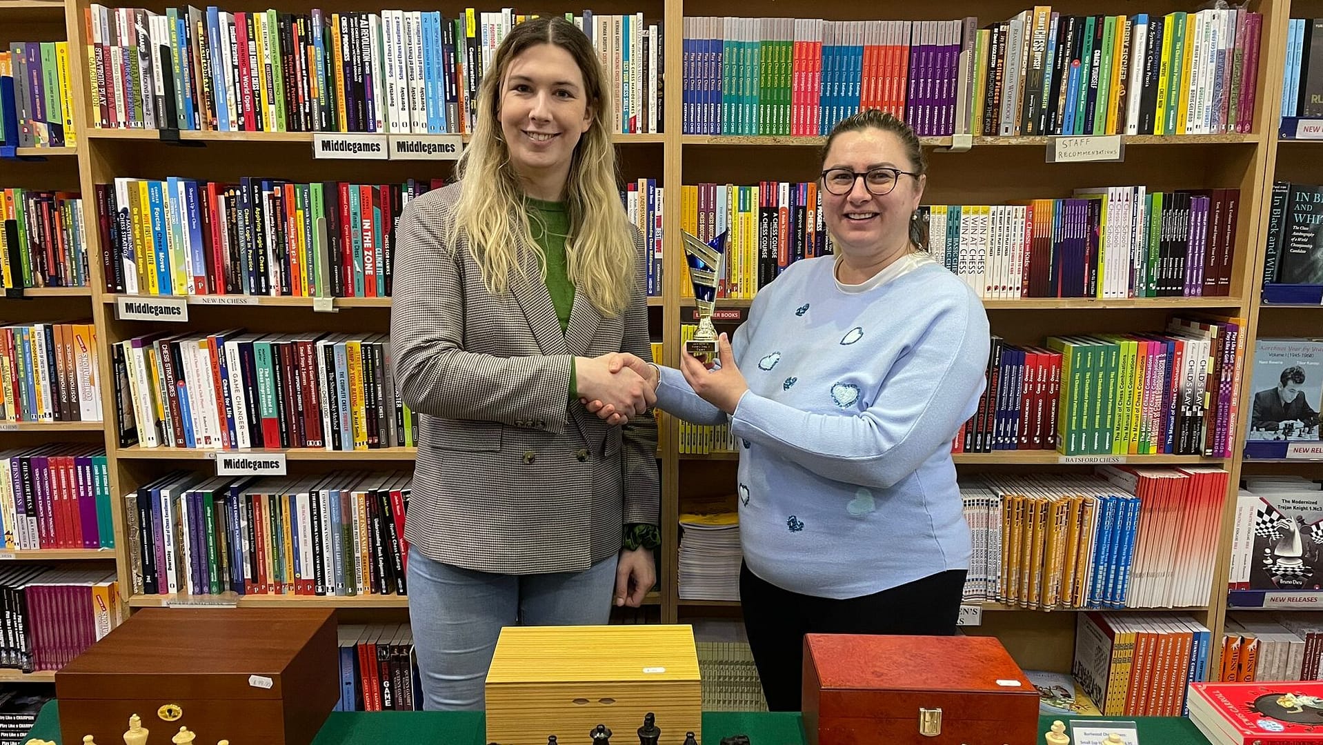 Djuna Tree accepts the award from ECF Director of Women's Chess Aga Milewska